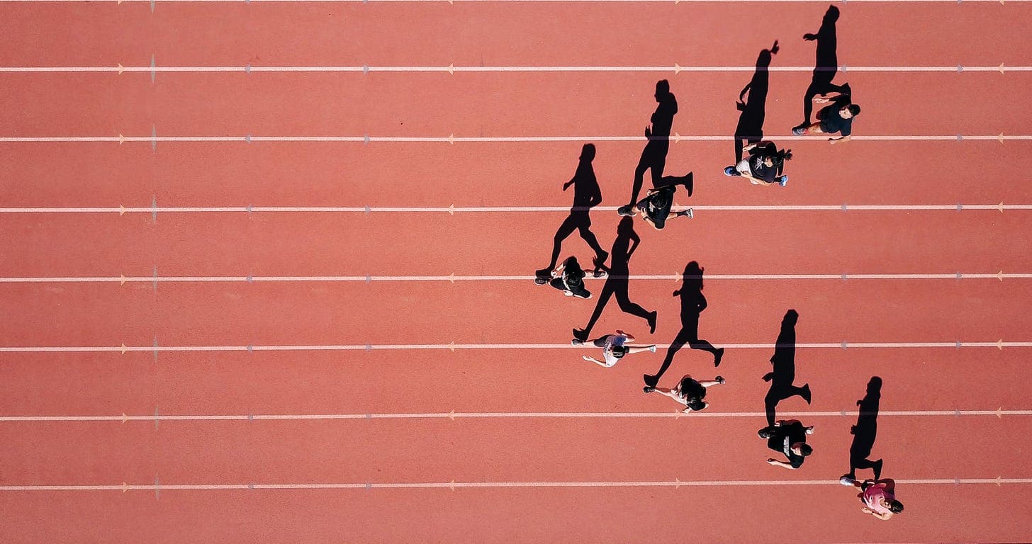 Race track with runners